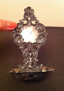 The reverse side of the Silver Holy Water Font