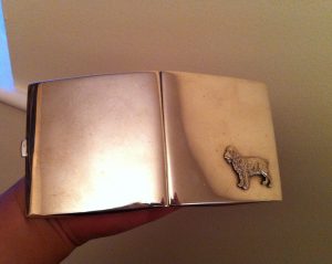 silver cigarette case dog
