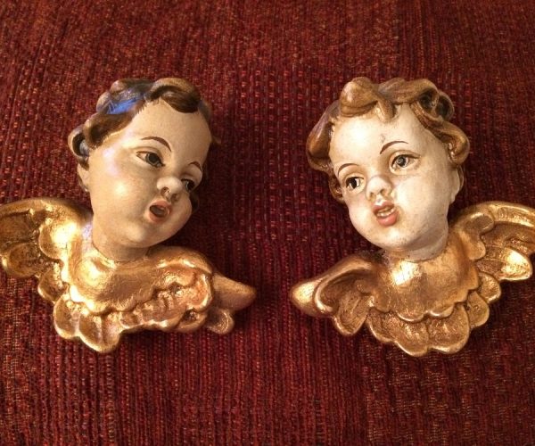 A pair of antique German gilded cherubs